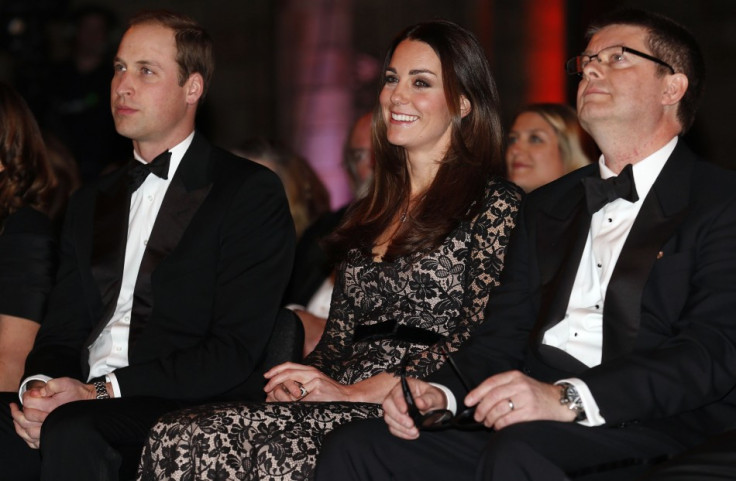 Kate enjoys screening along with Prince William and with Natural History Museum Director Michael Dixon (Reuters)