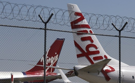Mike Dixon suffered the stroke on a Virgin flight between Las Vegas and London (Reuters)