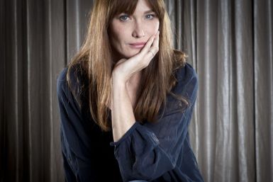 Carla Bruni-Sarkozy poses for a portrait as she promotes her new album "Little French Songs" in New York, June 25, 2013. (Reuters)
