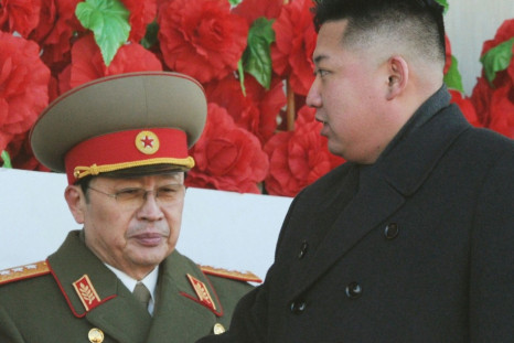 North Korean leader Kim Jong-un and his uncle Jang Song-thaek, whom he has executed, at a military parade to mark the birth anniversary of the North's late leader Kim Jong-il in Pyongyang, in 2012. (Reuters)