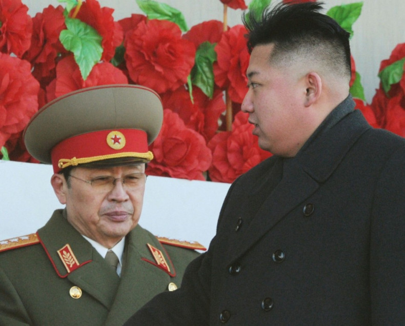 North Korean leader Kim Jong-un and his uncle Jang Song-thaek, whom he has executed, at a military parade to mark the birth anniversary of the North's late leader Kim Jong-il in Pyongyang, in 2012. (Reuters)
