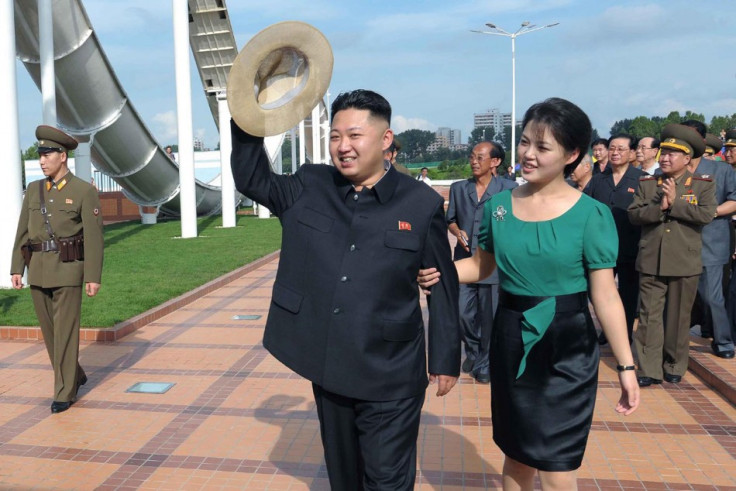North Korean leader Kim Jong-Un and his wife Ri Sol-ju during a ceremony