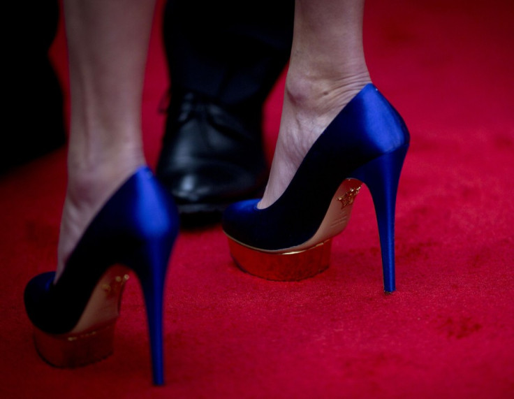 The heels up Julia's glamour quotient. (Reuters)