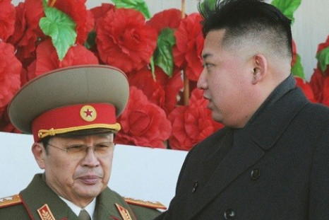 North Korean leader Kim Jong-un (R), flanked by his uncle Jang Song-thaek (Reuters)
