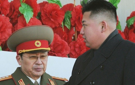 North Korean leader Kim Jong-un (R), flanked by his uncle Jang Song-thaek (Reuters)