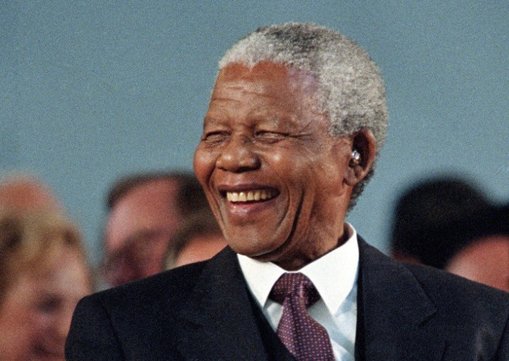 Then South African President Nelson Mandela smiles during a specially convened Harvard University ceremony honoring him in this September 18, 1998. (Reuters picture)