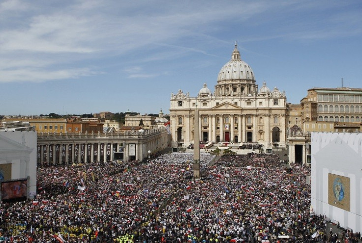 Thousands gather at the Vatican to mourn John Paul II