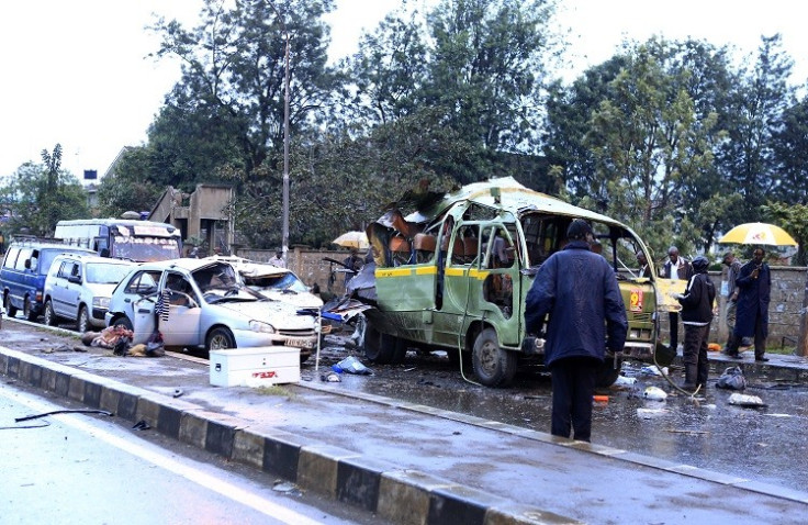 Damaged vehicles are seen at the scene of a blast near Pangani Police Station in Kenya's capital Nairobi, December 14, 2013.