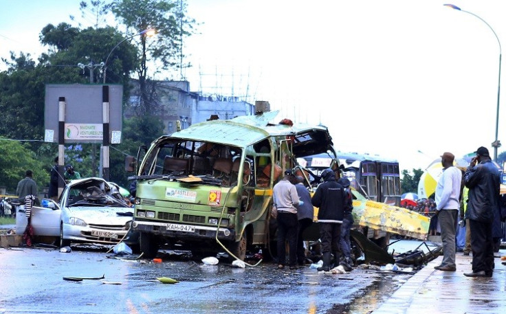 Damaged vehicles are seen at the scene of a blast near Pangani Police Station in Kenya's capital Nairobi, December 14, 2013