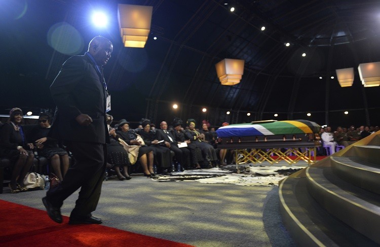 Former President of Zambia Kenneth Kaunda walks to the stage to speak during the funeral ceremony for former South African President Nelson Mandela in Qunu December 15, 2013. Reuters picture