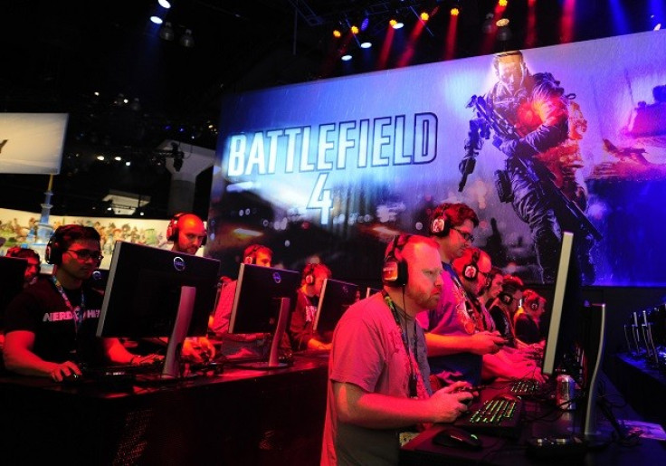 Gamers playing Battlefield 4 during E3 in Los Angeles, 2013