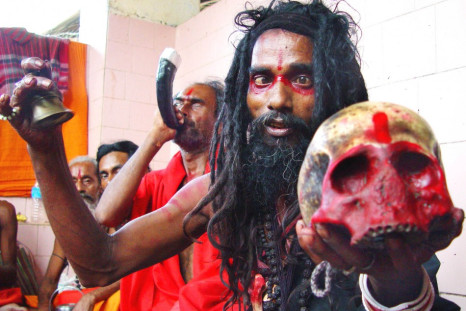 A Black Magic holyman holds a human skull at Guwahati's Kamakhya Temple, which is believed to be the highest seat of Tantra or black magic. A tantrik has been arrested for killing a woman in a human sacrifice in Mumbai. (Reuters)