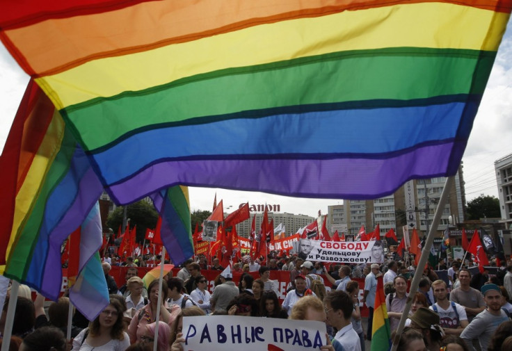 Gay rights activists take part in an opposition protest march in Moscow