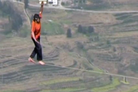 American Slack Liner walks across Canyon In China