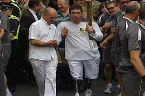 Soldier injured in Afghanistan carries Olympic Torch