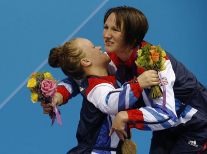 Britain cement second place with triple gold