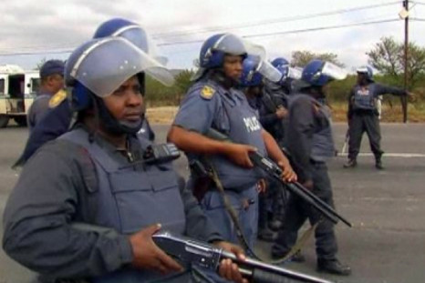 South Africa police fire at Marikana mine protesters
