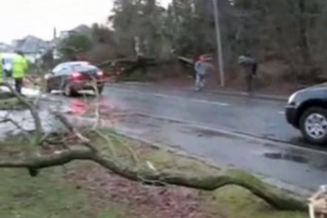 Three dead: floods and gales batter Britain