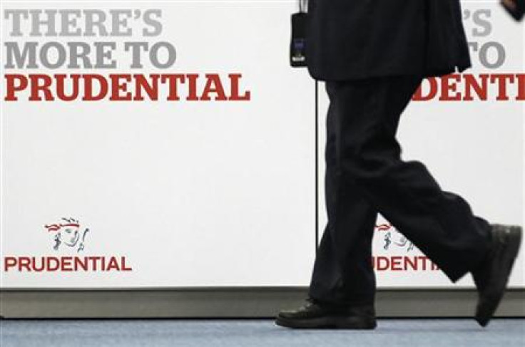 Shareholder arrives at Prudential&#039;s annual general meeting in central London