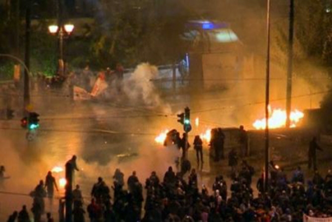 Greek police and protestors clash on streets of Athens