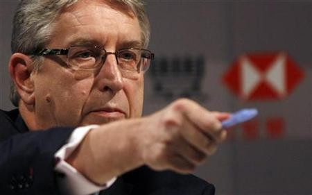 HSBC Group Chief Executive Michael Geoghegan picks a journalist to ask a question during a news conference announcing the bank's results in Hong Kong