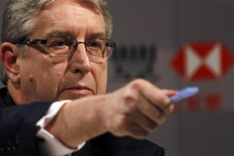 HSBC Group Chief Executive Michael Geoghegan picks a journalist to ask a question during a news conference announcing the bank's results in Hong Kong