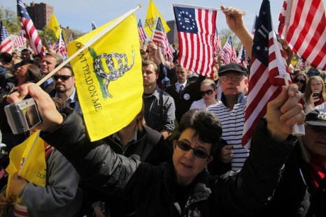 Supporters cheer at a Tea Party Express rally.