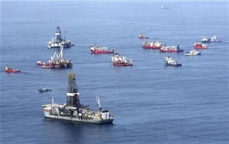 Drill ships and response vessels work in the Gulf of Mexico off the Louisiana coast line