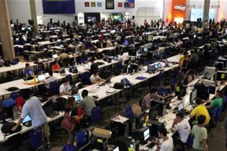 People surf the web during a &quot;Campus Party&quot; Internet users gathering in Sao Paulo