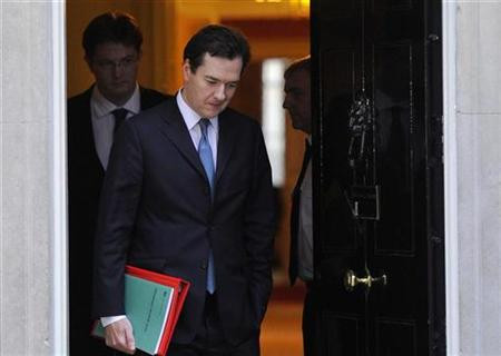 Britain's Finance Minister Osborne and Chief Secretary to the Treasury Alexander leave Downing Street in London