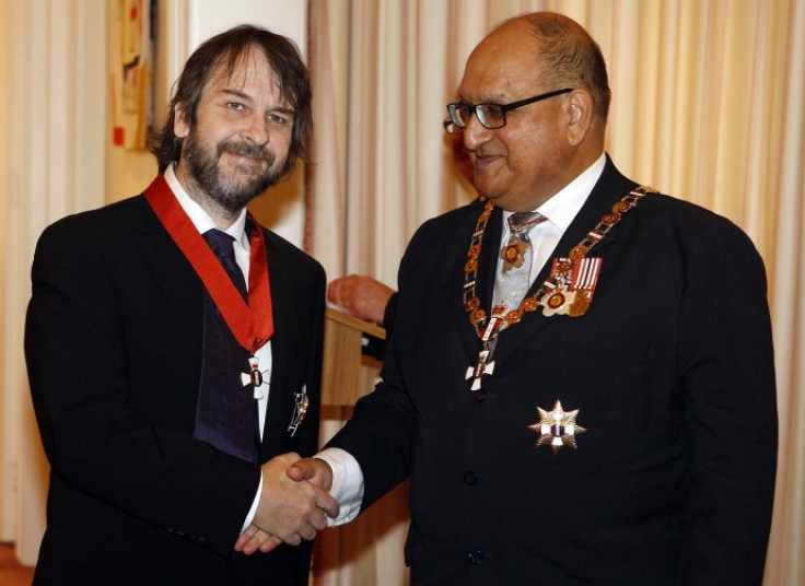 Director Jackson of New Zealand shakes hands with New Zealand's Governor-General Satyanand after being knighted in April, 2010