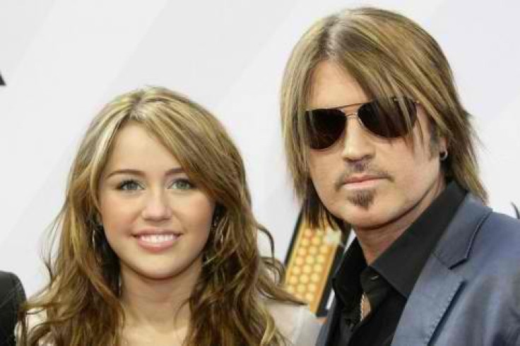 Miley Cyrus with father Billy Ray Cyrus