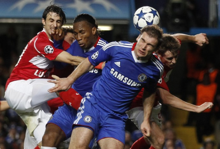 Chelsea's Drogba and Ivanovic challenge Spartak Moscow's Pareja during their Champions League soccer match in London.