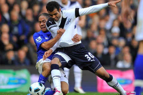 Everton's Pienaar challenges for the ball with Tottenham's Sandro (R) during their English Premier League soccer match in London.