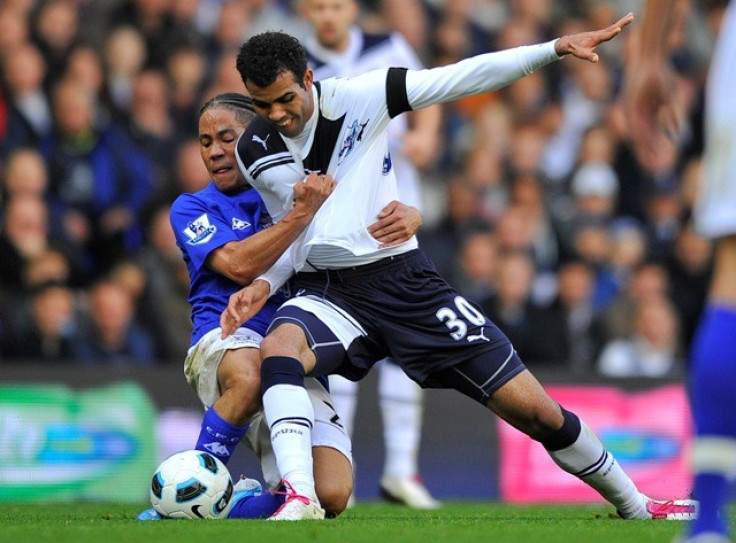 Everton's Pienaar challenges for the ball with Tottenham's Sandro (R) during their English Premier League soccer match in London.