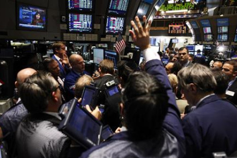 Traders work on the floor of the New York Stock Exchange