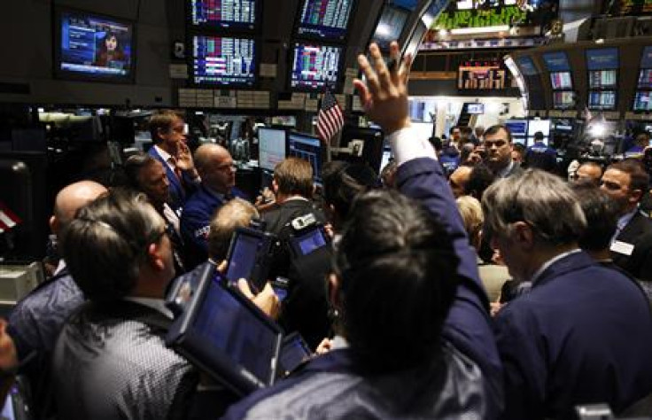 Traders work on the floor of the New York Stock Exchange