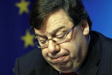 Ireland's Prime Minister Brian Cowen pauses during a news conference at Government Buildings in Dublin - file photo.
