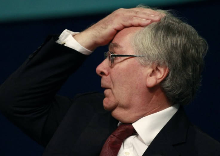 Bank of England Governor Mervyn King gestures during a speech