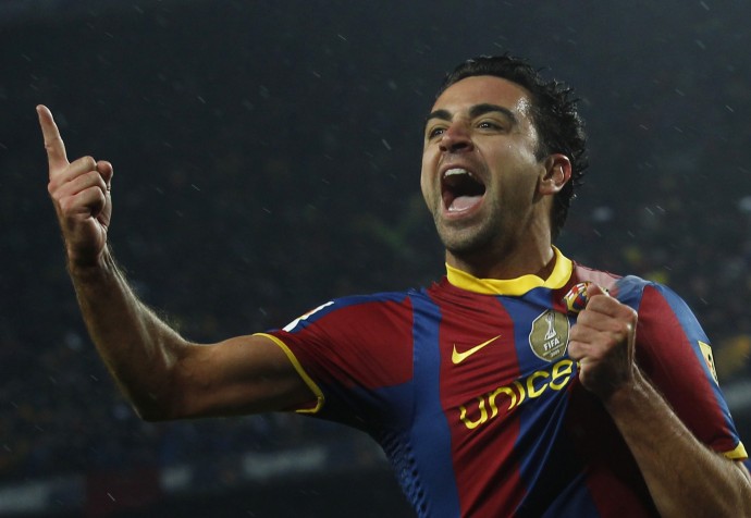 Barcelonas Xavi celebrates after scoring against Real Madrid during their Spanish first division soccer match in Barcelona on 29112010.