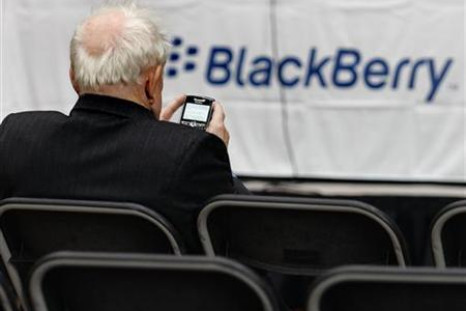 A RIM shareholder uses their Blackberry in Waterloo