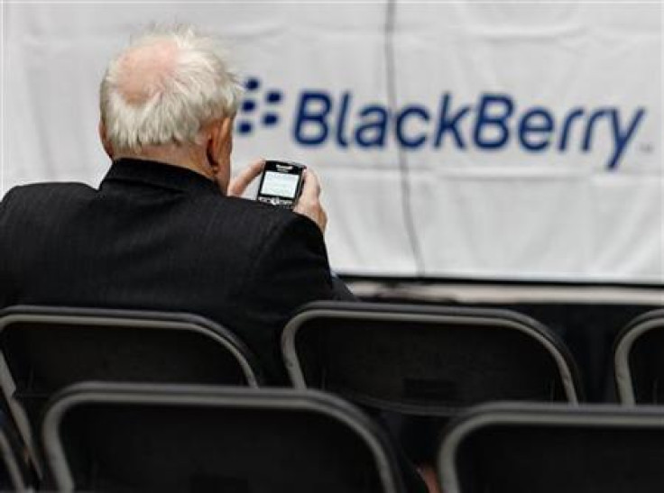 A RIM shareholder uses their Blackberry in Waterloo