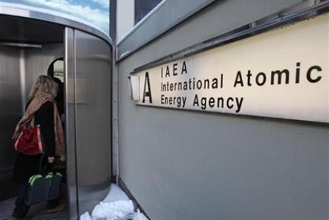 A woman enters the International Atomic Energy Agency (IAEA) headquarters at the UN premises in Vienna
