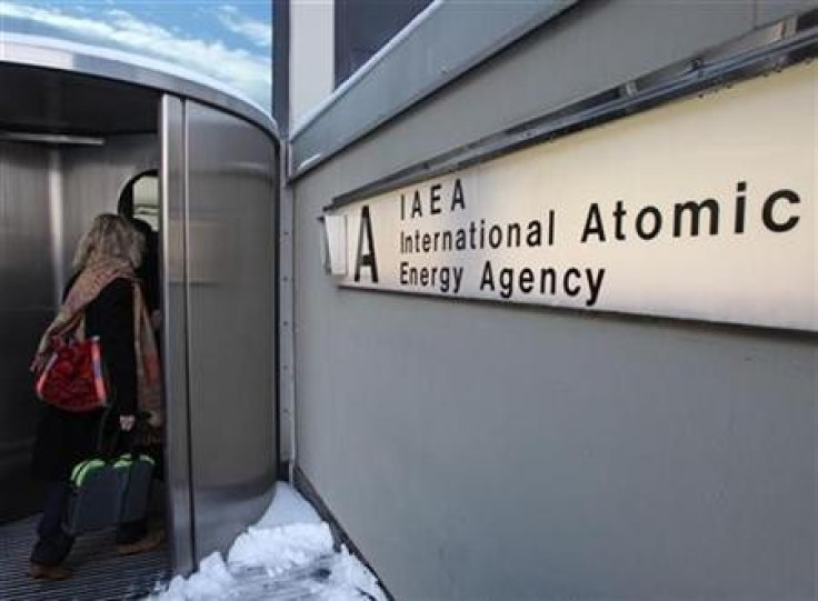 A woman enters the International Atomic Energy Agency (IAEA) headquarters at the UN premises in Vienna