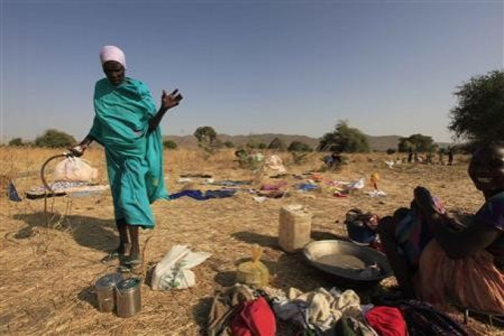 Nearly 900 people died in series of raids between two warring cattle herding tribes in South Sudan