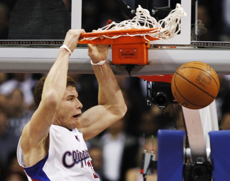 Los Angeles Clippers' Griffin slam dunks against the Miami Heat during their NBA basketball game in Los Angeles