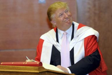 U.S. businessman Donald Trump smiles during a ceremony in which he was awarded an honorary degree, at Robert Gordon University in Aberdeen October 8, 2010.