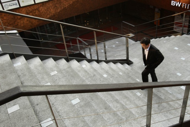 A businessman walks at a financial district in central Seoul