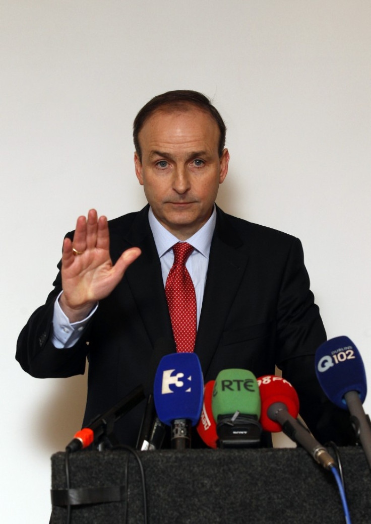 Ireland's Foreign Minister Martin gestures during a news conference at a hotel in Dublin