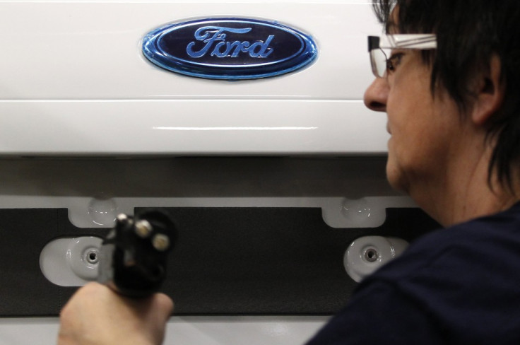 An employee works at the assembly line of the Ford car factory of Saarlouis